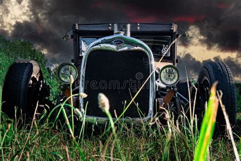 Black Rat Rod In A Field Under The Stormy Sky In Orillia Ontario