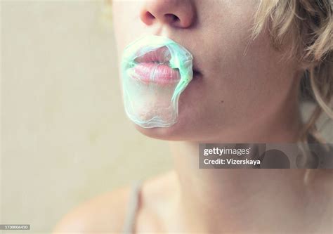 Burst Bubble Of Chewing Gum High-Res Stock Photo - Getty Images