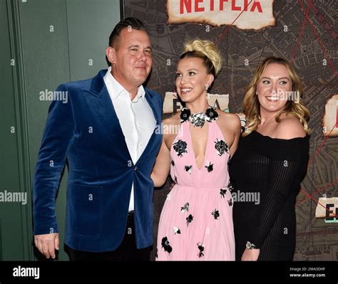 Millie Bobby Brown Center Poses With Her Father Robert Brown Left