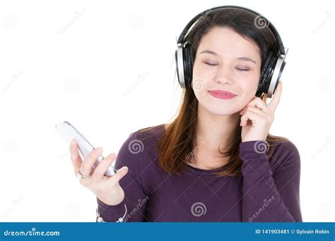 Young Woman With Headphones Eyes Closed And Mobile Phone Stock Image