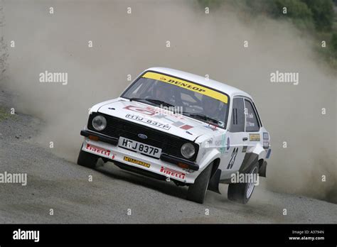 A Ford Escort Mk2 Rally Car Kicks Up The Dust Stock Photo Alamy