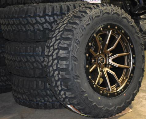 20x10 Fuel D681 Bronze Rebel Wheels 35 MT Tires 6x135 Ford F150 Raptor