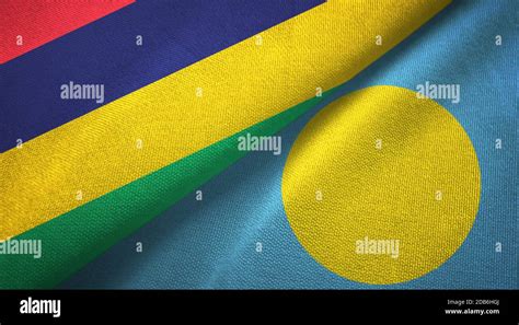 Mauritius And Palau Two Flags Textile Cloth Fabric Texture Stock Photo