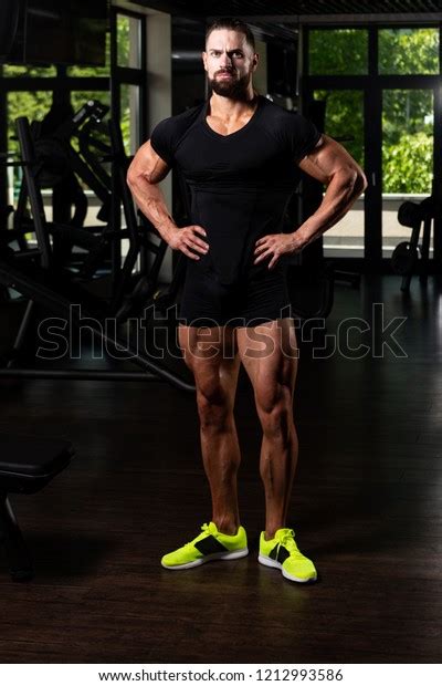 Portrait Handsome Personal Trainer Wearing Sportswear Stock Photo