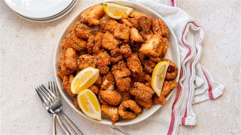 Lemon Makes All The Difference In Your Fried Fish Dishes