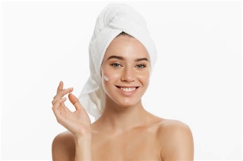 Premium Photo Beauty Portrait Of A Smiling Beautiful Half Naked Woman Applying Face Cream