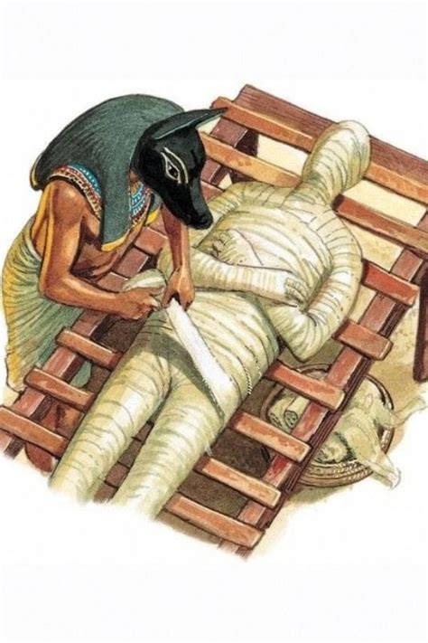 An Egyptian Woman Laying On Top Of A Wooden Bed Next To A Man In A Turban