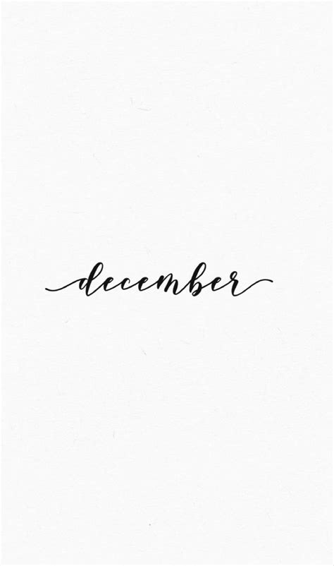 A Black And White Photo With The Word December Written In Cursive