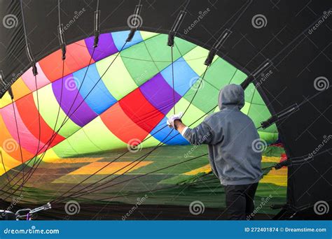 Colorful Hot Air Balloon View From Inside Person Taking Care Of Hot Air Balloon Stock Photo