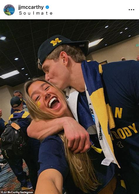 Michigan Quarterback Jj Mccarthy Shares A Celebratory Kiss With