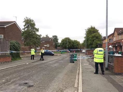 Man, 21, fighting for life in hospital after being shot through door of ...