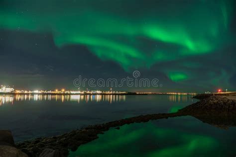 Scenic View of Northern Lights Over Reykjavik Stock Image - Image of ...