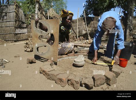 Women From Sanitation Committee Making Latrines In Order To Raise