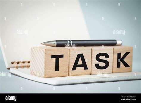 task office notebook   wooden blocks   word task written