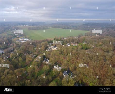 Aerial View Of Houses Surrounded By Forest In The Country Side Area Of