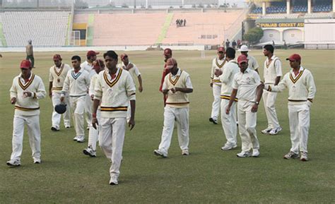 The Groundstaff Rush To Cover The Pitch At The MA Chidambaram Stadium