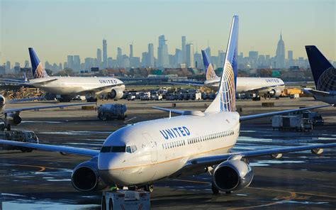 Download United Airlines Airplane In Newark Liberty International Airport Wallpaper