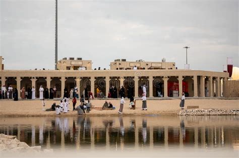 Reflection of the Sky and the Qatari Flag on a Lake during National Day ...