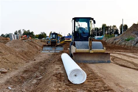 Dozer During Roadwork At Construction Site Bulldozer For Land Clearing