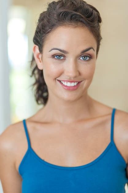 Premium Photo Portrait Of Smiling Mid Adult Woman Standing At Home