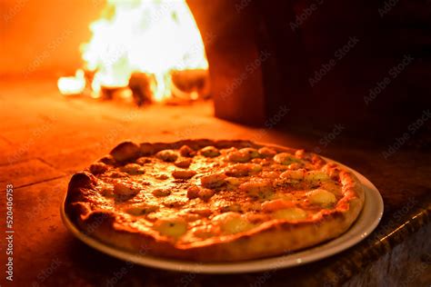 Pizza Assada No Forno A Lenha Stock Photo Adobe Stock