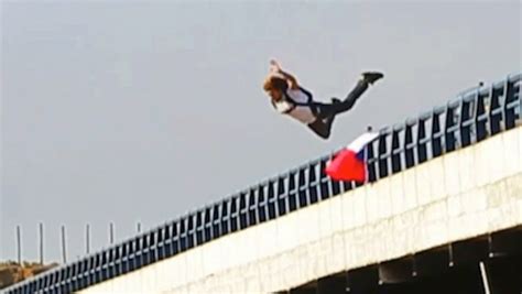 BASE Jumper Leaps off a Bridge From the Back of a Moving Truck