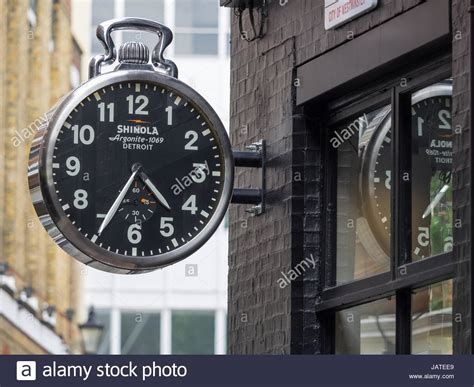 A Giant Shinola Watch Hangs Outside A Shinola Store Just Off Londons