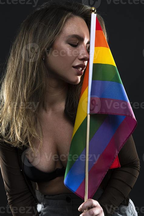 Lesbian Woman Holding Rainbow Flag Isolated On Black Background Lgbt