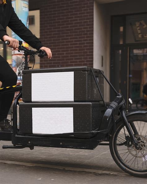 Premium Photo | Black cargo courier bike with two boxes closeup and ...