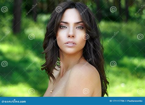 Beautiful Brunette Woman With Perfect Skin Outdoor Spring Portrait On