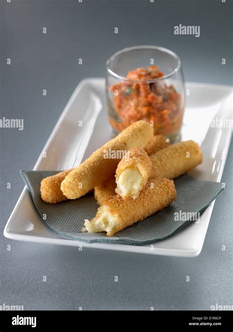 Fried breaded cheese sticks Stock Photo - Alamy