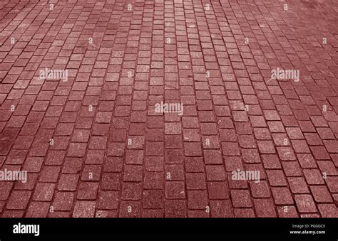 Red Brown Colored Concrete Block Paved Pathway For Texture Background