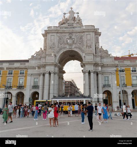 Commercial Square And The Rua Augusta Arch In Lisbon Portugal Tram