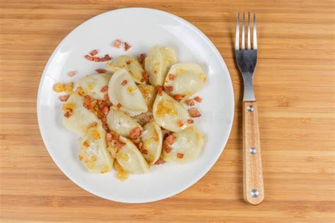 Cooked Filled Dumplings Flavored With Fried Bacon And Onion Fork Stock