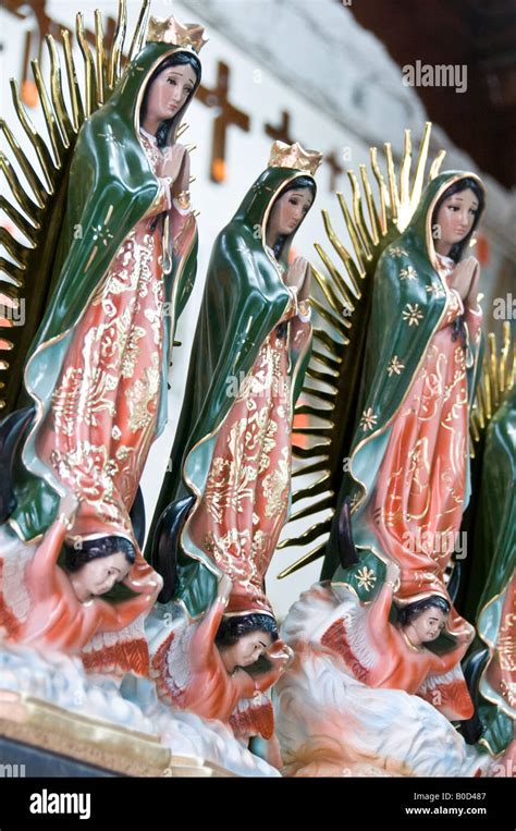 Statues In Honour Of The Revered Virgin Of Guadalupe Seen Throughout Mexico Sold In A Shop