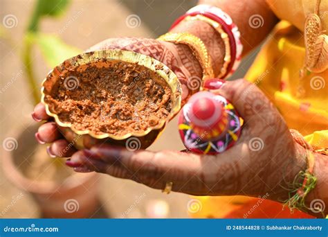 Indian Bride Holding Turmeric Paste Or Haldi Paste In Hand In A Hindu