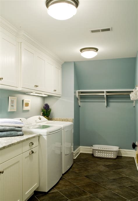 Laundry Room With White Recessed Panel Beadboard Cabinets Traditional