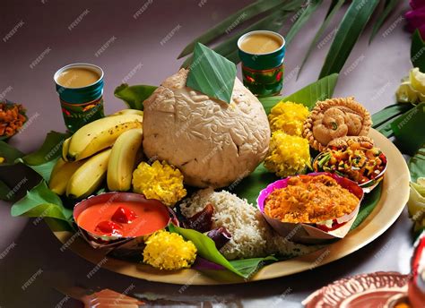 Premium Photo Onam Feast Eating Onasadya In Banana Leaf During The