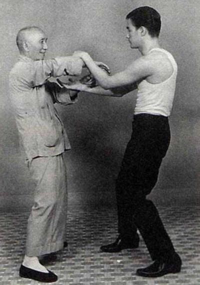 Ip Man sparring with his student, Bruce Lee. 1958. : OldSchoolCool