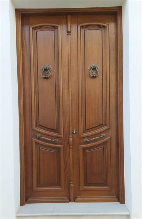 Puerta De Entrada De Madera Maciza De Iroko Fabricación A Medida