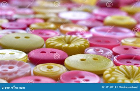 Bright Pink and Yellow Sewing Buttons Stock Photo - Image of round, circle: 111143314