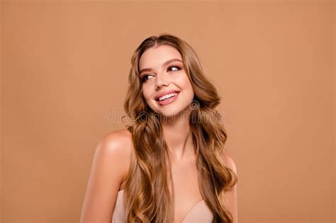 Photo Of Positive Lovely Girl Nude Shoulders Empty Space Isolated On Beige Color Background