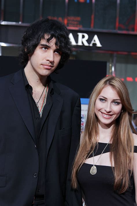 Nick Simmons And Date At The World Premiere Of Prom ©2011 Sue