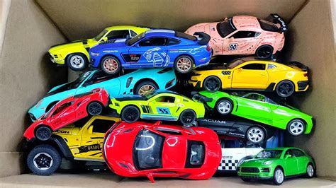 Box Full Of Model Cars Lamborghini Mclaren Lexus Lm H Porsche