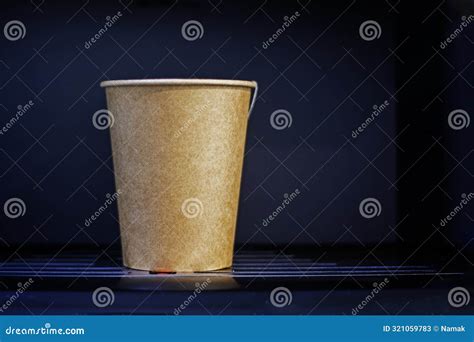 Vending Machine With A Disposable Recyclable Cardboard Cup Containing