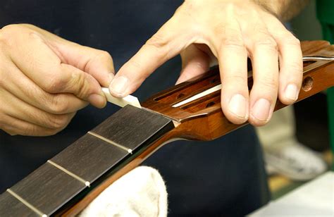 How The Classical Guitar Is Made：adjust The Nut And Bridge To Suit The Actual Guitar Musical