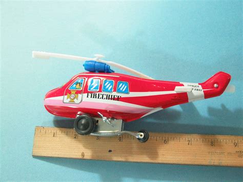 Vintage Windup Metal Helicopter Toy Fire Chief Fire Department