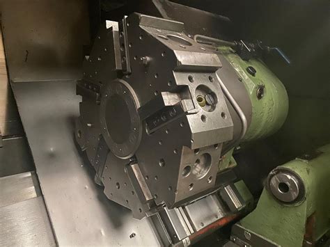 VICTOR TNS-3H CNC lathe with Fanuc series 15-T control. Year 1988