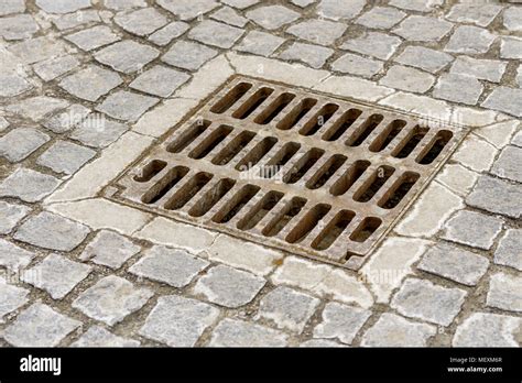 Storm Sewer Grate Stock Photos And Storm Sewer Grate Stock Images Alamy