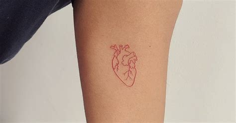 Fine Line Red Anatomical Heart Tattoo Done On The Inner